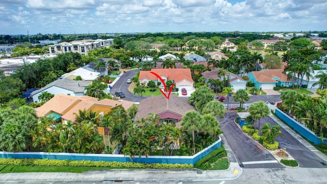 birds eye view of property with a residential view