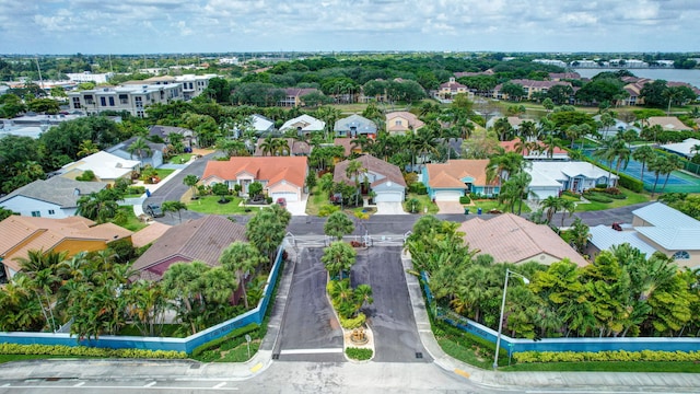 birds eye view of property with a residential view