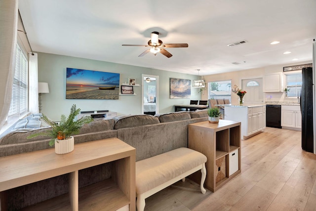 5810 Tucker Rd, Jupiter, FL 33458 - living area featuring a ceiling fan, light wood-style flooring, recessed lighting, and healthy amount of natural light