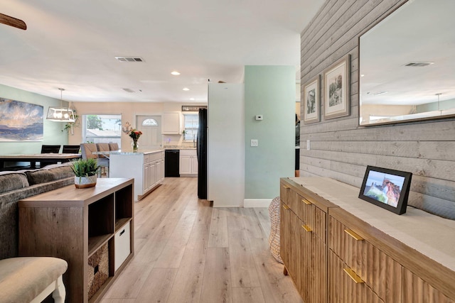 5810 Tucker Rd, Jupiter, FL 33458 - living room with light wood finished floors, recessed lighting, and baseboards