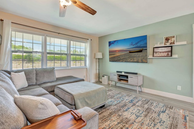 5810 Tucker Rd, Jupiter, FL 33458 - living room with baseboards, ceiling fan, and wood finished floors