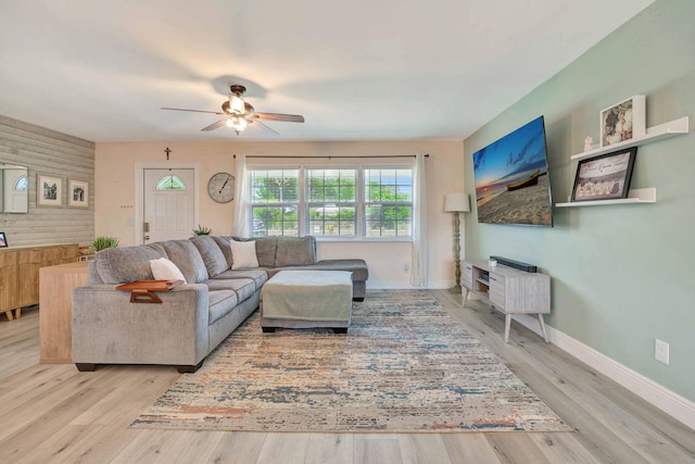 5810 Tucker Rd, Jupiter, FL 33458 - living area with ceiling fan, baseboards, and light wood finished floors