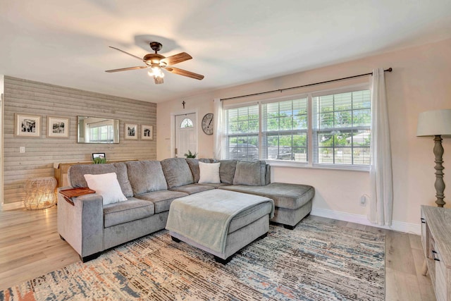 5810 Tucker Rd, Jupiter, FL 33458 - living room featuring ceiling fan, light wood-style floors, and baseboards