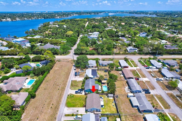 5810 Tucker Rd, Jupiter, FL 33458 - aerial overview of property's location featuring a nearby body of water and nearby suburban area