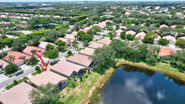 aerial view with a water view and a residential view