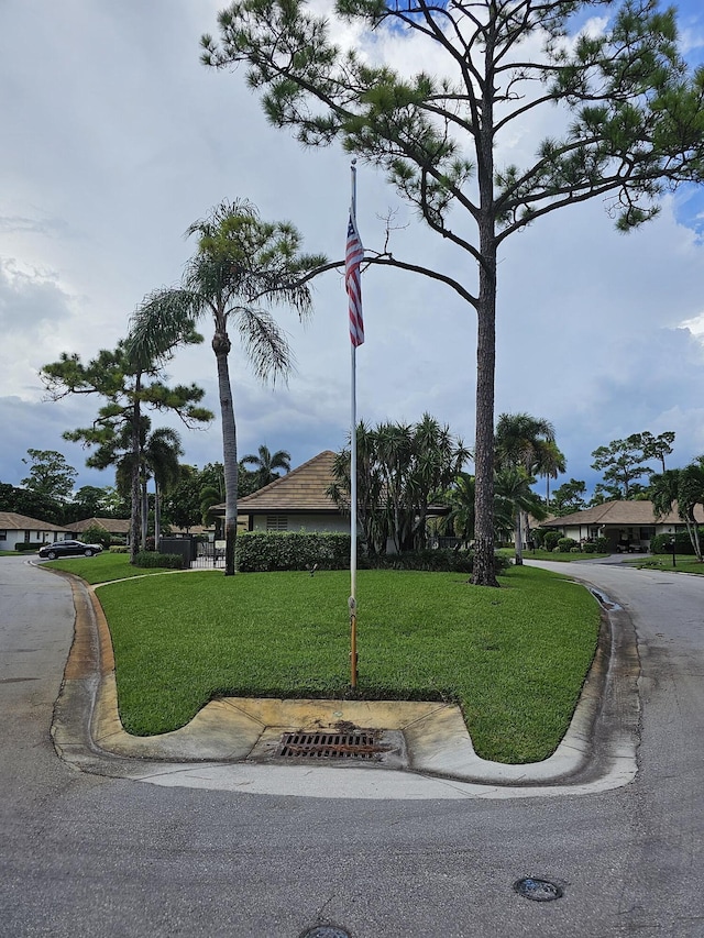 surrounding community featuring a lawn