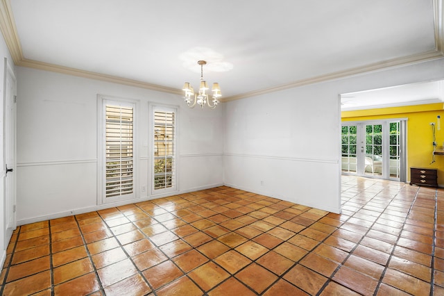 tiled empty room featuring ornamental molding, french doors, a chandelier, and baseboards