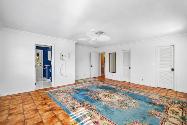 interior space featuring visible vents, ceiling fan, ornamental molding, and baseboards