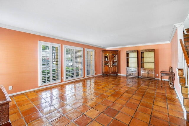 unfurnished living room with crown molding, stairs, tile patterned flooring, and baseboards