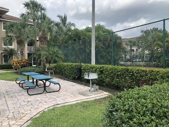 6450 Emerald Dunes Dr Unit 301, West Palm Beach, FL 33411 - view of property's community featuring a patio