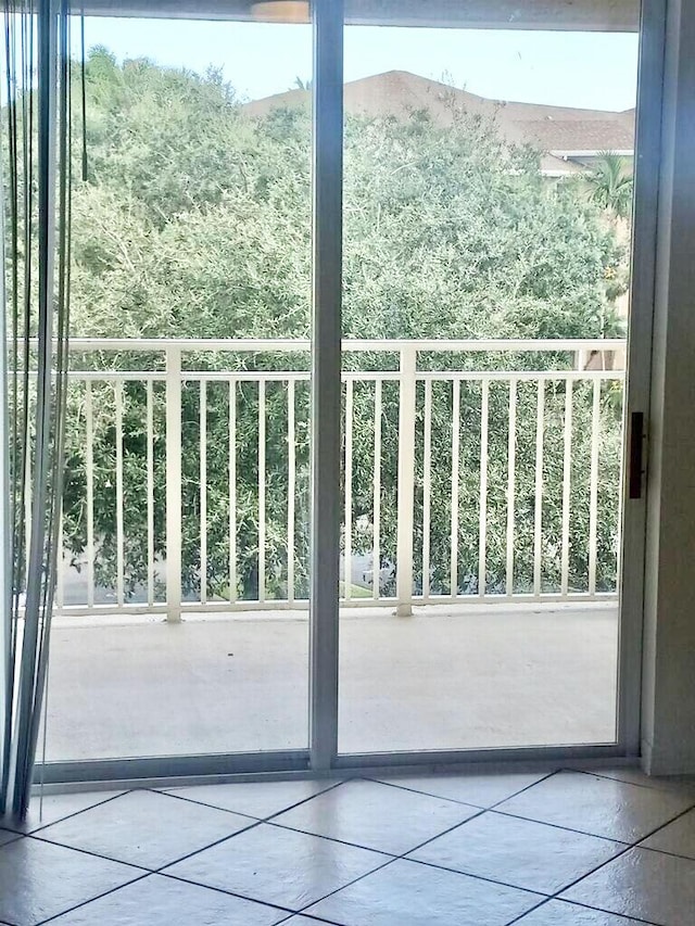 6450 Emerald Dunes Dr Unit 301, West Palm Beach, FL 33411 - entryway with tile patterned floors