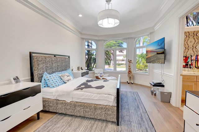 7090 Ayrshire Ln, Boca Raton, FL 33496 - bedroom featuring ornamental molding, light wood finished floors, and ensuite bath