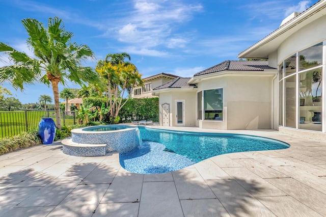 7090 Ayrshire Ln, Boca Raton, FL 33496 - view of swimming pool with a patio, fence, and a pool with connected hot tub