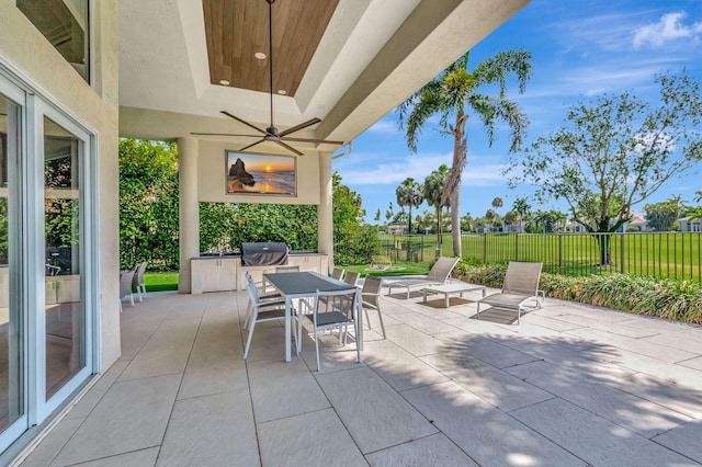7090 Ayrshire Ln, Boca Raton, FL 33496 - view of patio featuring fence, outdoor dining area, area for grilling, and ceiling fan