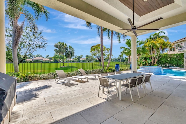 7090 Ayrshire Ln, Boca Raton, FL 33496 - view of patio featuring fence and a pool with connected hot tub