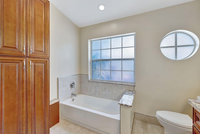 full bathroom with toilet, recessed lighting, a bath, vanity, and tile patterned flooring
