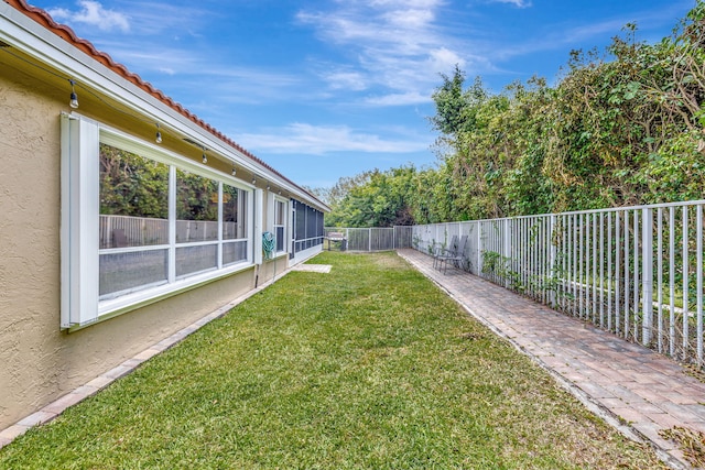 view of yard featuring a fenced backyard