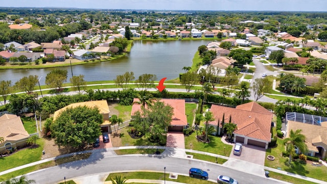aerial view featuring a residential view and a water view