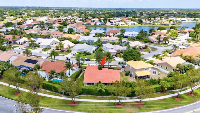 aerial view with a water view and a residential view