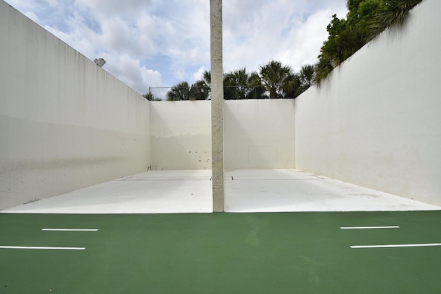 view of patio featuring fence