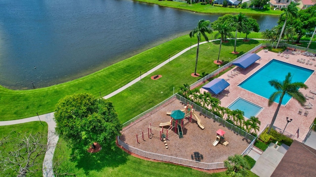 birds eye view of property with a water view
