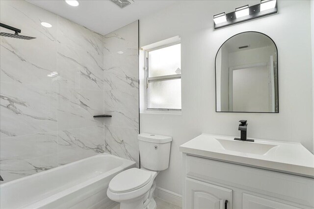 bathroom featuring bathtub / shower combination, vanity, toilet, baseboards, and visible vents