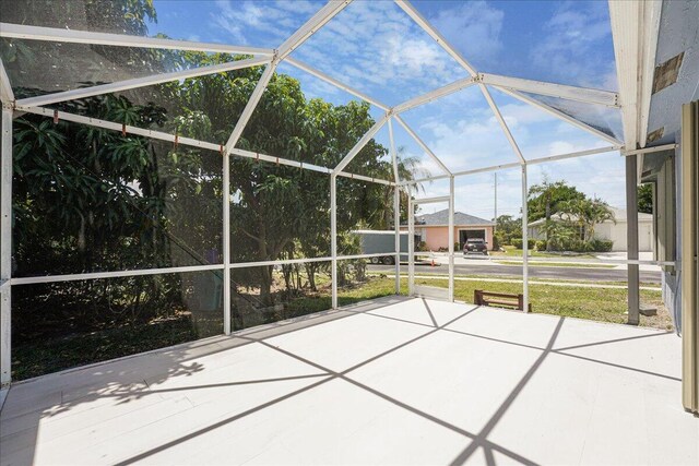 view of patio with a lanai