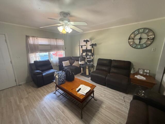 1126 S L St, Lake Worth Beach, FL 33460 - living room featuring ceiling fan, ornamental molding, and wood finished floors