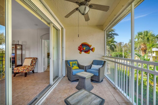 balcony featuring a ceiling fan