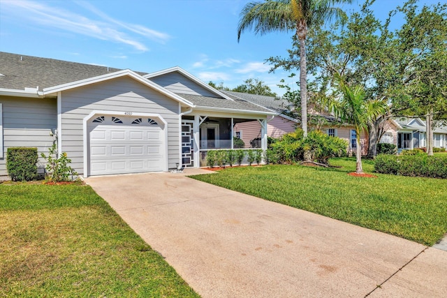 ranch-style house featuring covered porch, driveway, a front yard, an attached garage, and a shingled roof