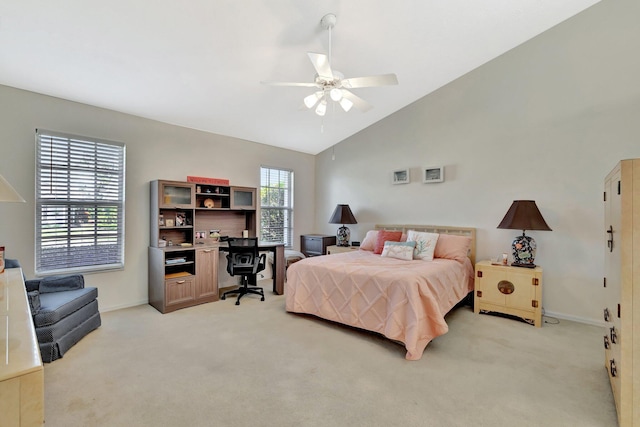4059 Gator Trace Rd, Fort Pierce, FL 34982 - bedroom featuring an office area, light carpet, ceiling fan, high vaulted ceiling, and baseboards