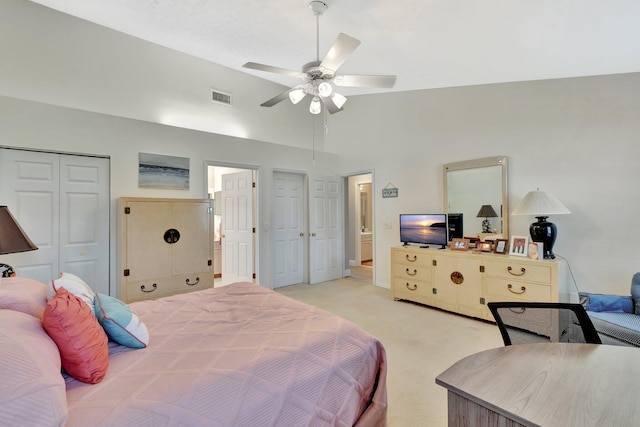 4059 Gator Trace Rd, Fort Pierce, FL 34982 - bedroom featuring light colored carpet, ceiling fan, a towering ceiling, and a closet
