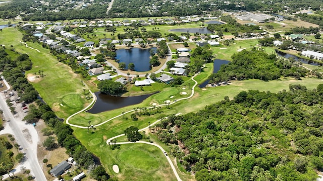 drone / aerial view with a water view and a residential view