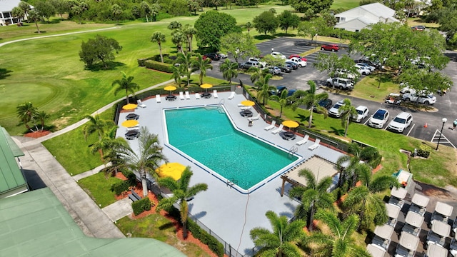 birds eye view of property with golf course view