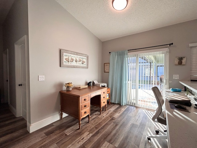 6446 Terra Rosa Cir, Boynton Beach, FL 33472 - home office with dark wood-type flooring, a textured ceiling, vaulted ceiling, and baseboards
