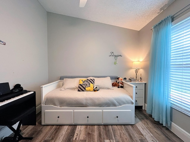 6446 Terra Rosa Cir, Boynton Beach, FL 33472 - bedroom featuring wood finished floors, baseboards, a textured ceiling, and ceiling fan