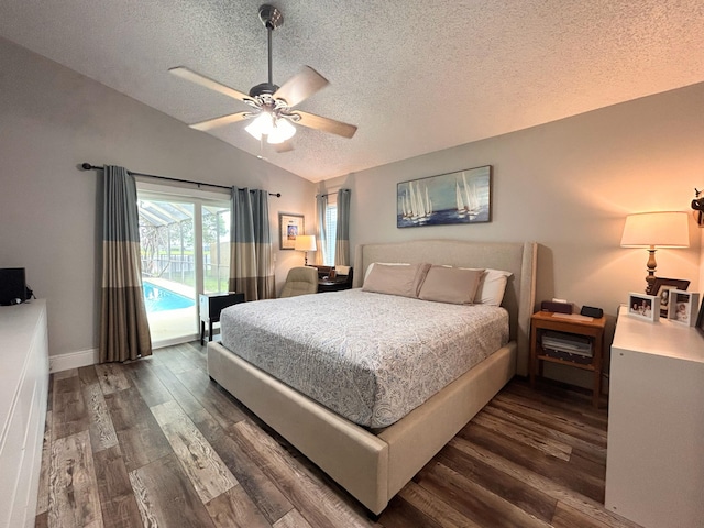 6446 Terra Rosa Cir, Boynton Beach, FL 33472 - bedroom with a textured ceiling, access to outside, vaulted ceiling, dark wood-style floors, and baseboards