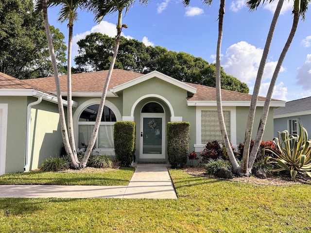 6446 Terra Rosa Cir, Boynton Beach, FL 33472 - single story home with stucco siding, a front lawn, and a shingled roof