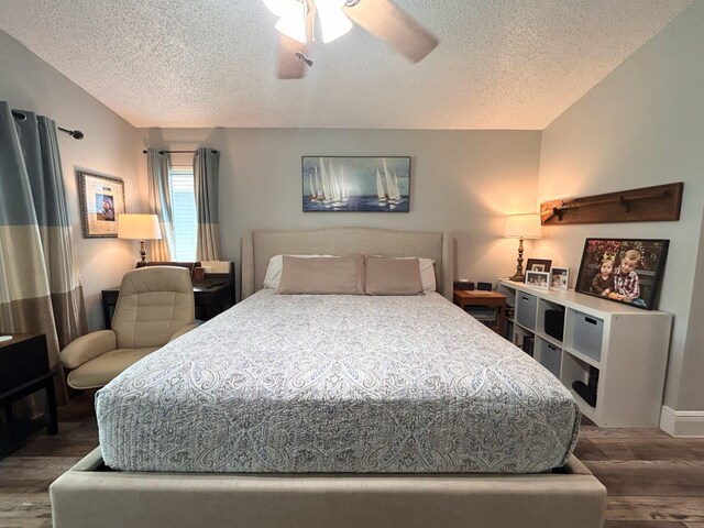 6446 Terra Rosa Cir, Boynton Beach, FL 33472 - bedroom with lofted ceiling, dark wood-type flooring, access to outside, ceiling fan, and a textured ceiling