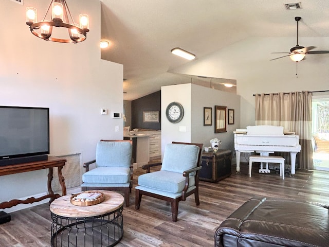 6446 Terra Rosa Cir, Boynton Beach, FL 33472 - living area with lofted ceiling, wood finished floors, ceiling fan, and a chandelier