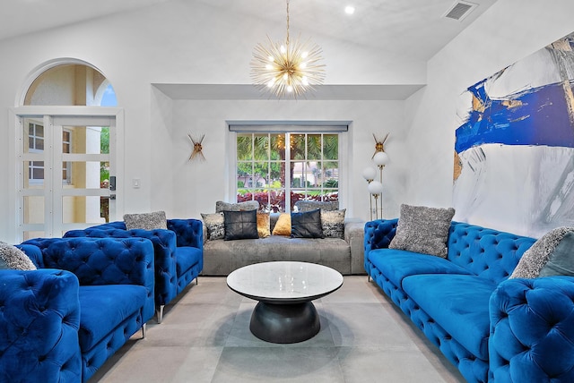 living room with concrete flooring, a notable chandelier, visible vents, and lofted ceiling
