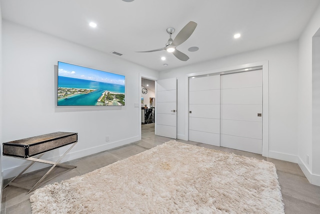 unfurnished bedroom with visible vents, a ceiling fan, baseboards, and a closet