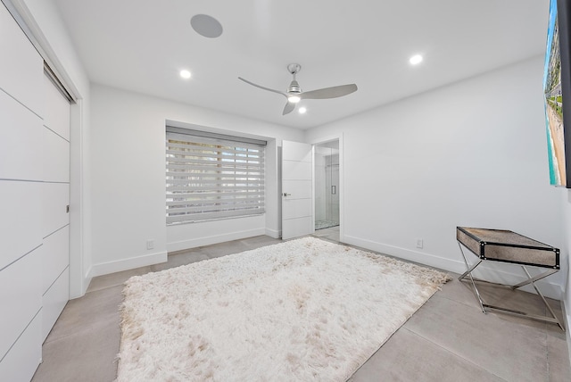 unfurnished bedroom featuring baseboards, recessed lighting, concrete floors, and ceiling fan