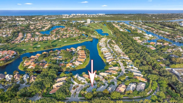 birds eye view of property featuring a residential view and a water view
