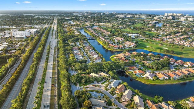 birds eye view of property featuring a residential view and a water view