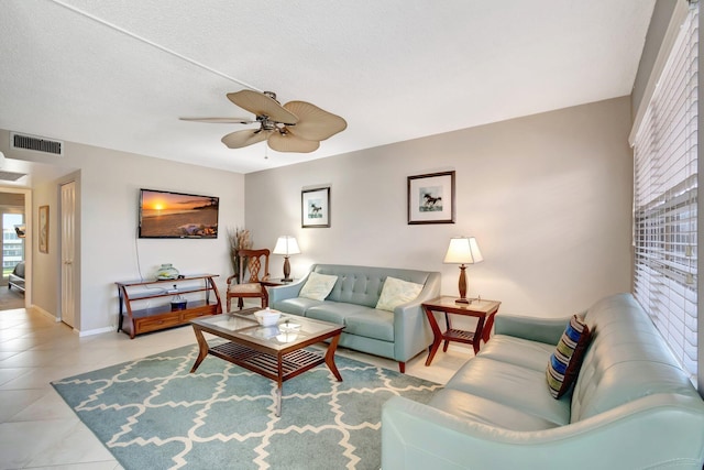 4049 Wolverton C, Boca Raton, FL 33434 - living room with ceiling fan and light tile patterned flooring
