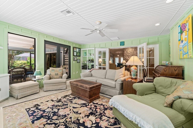 sunroom / solarium featuring french doors and visible vents