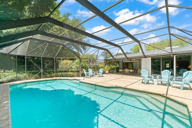 pool featuring a patio area and a lanai