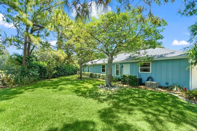 view of yard with an attached garage