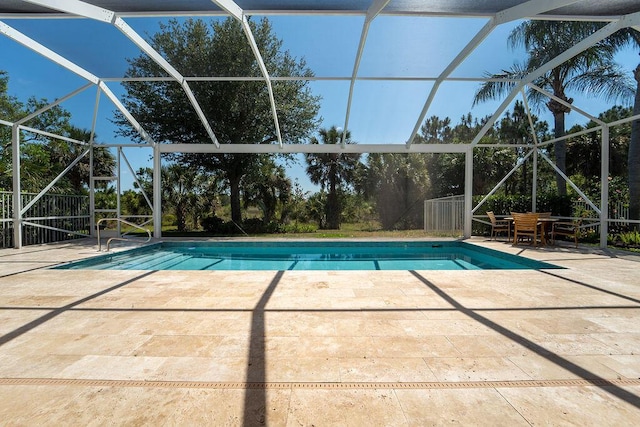 3352 SE Cascadia Way, Hobe Sound, FL 33455 - outdoor pool with a patio area and a lanai